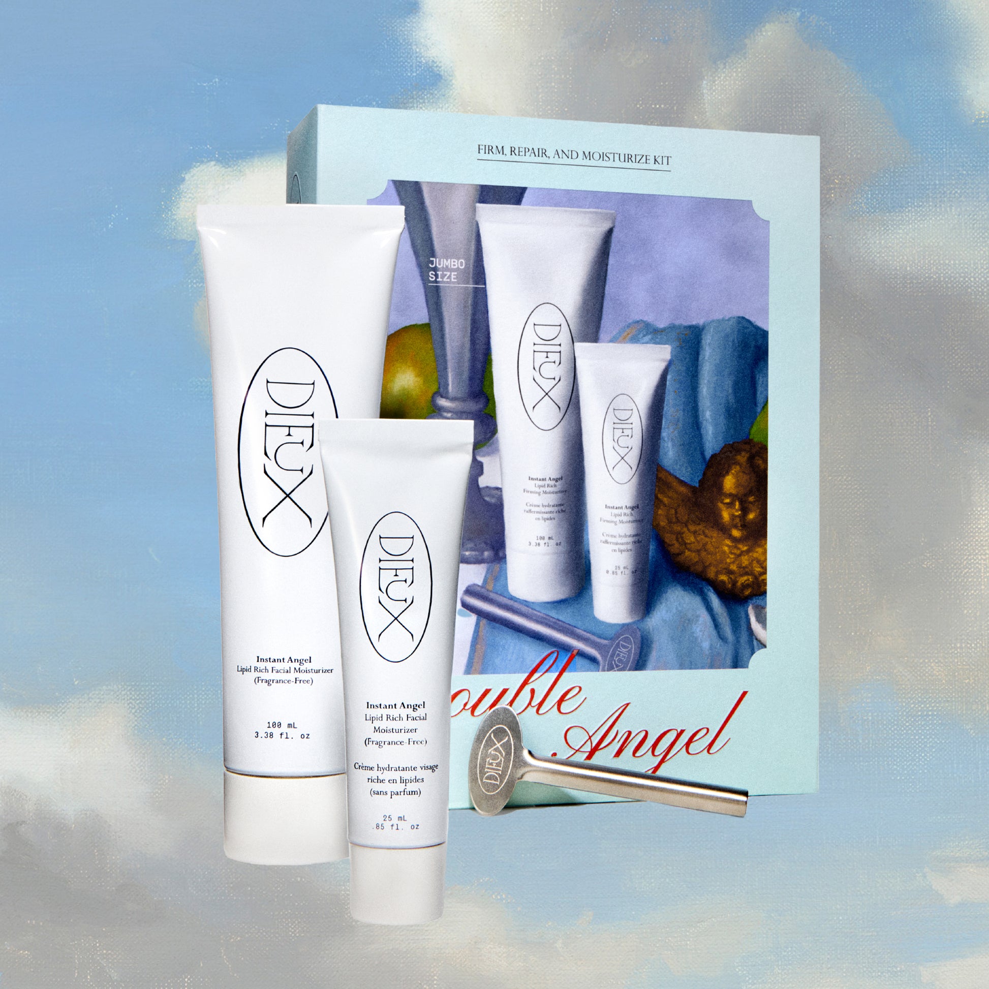 Dieux Double Angel Set on a blue and white cloud background. Features the box the set comes in and the three products: Instant Angel Moisturizer 100ml, Instant Angel Moisturizer 25ml, and Squeeze Key. 