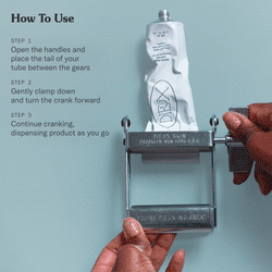 How to use: Open the handles and place the tail of your tube between the gears. Gently clamp down and turn the cramp forward. Continue cranking, dispensing product as you go.