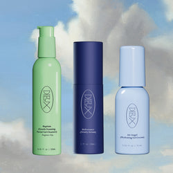 Dieux Skin products on painted cloud background: Baptism Gel Cleanser Fragrance Free, Deliverance Serum, Air Angel Gel Cream