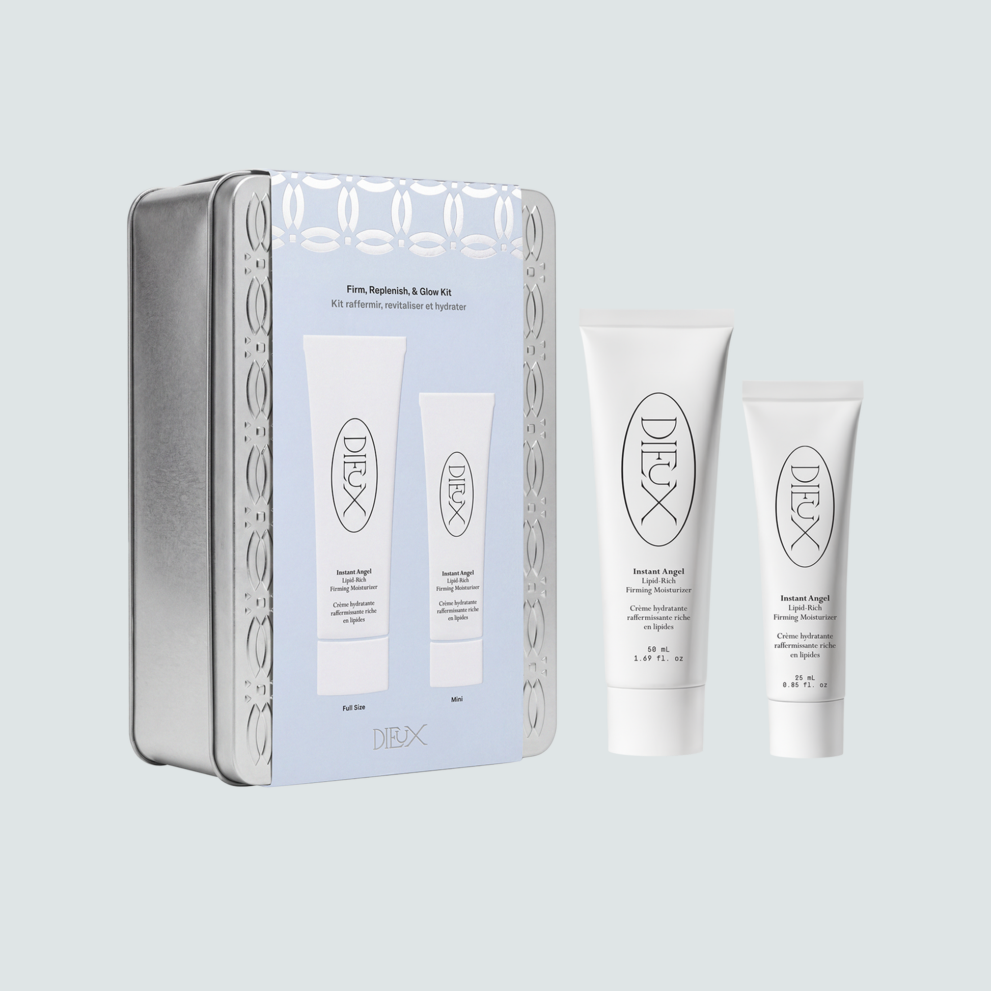 Dieux Hydration-On-Loop Kit. Firm, replenish, & glow duo with mini & full-size Instant Angel Lipid-Rich Firming Moisturizer. Packaged in a custom patterned tins for collecting keepsakes.