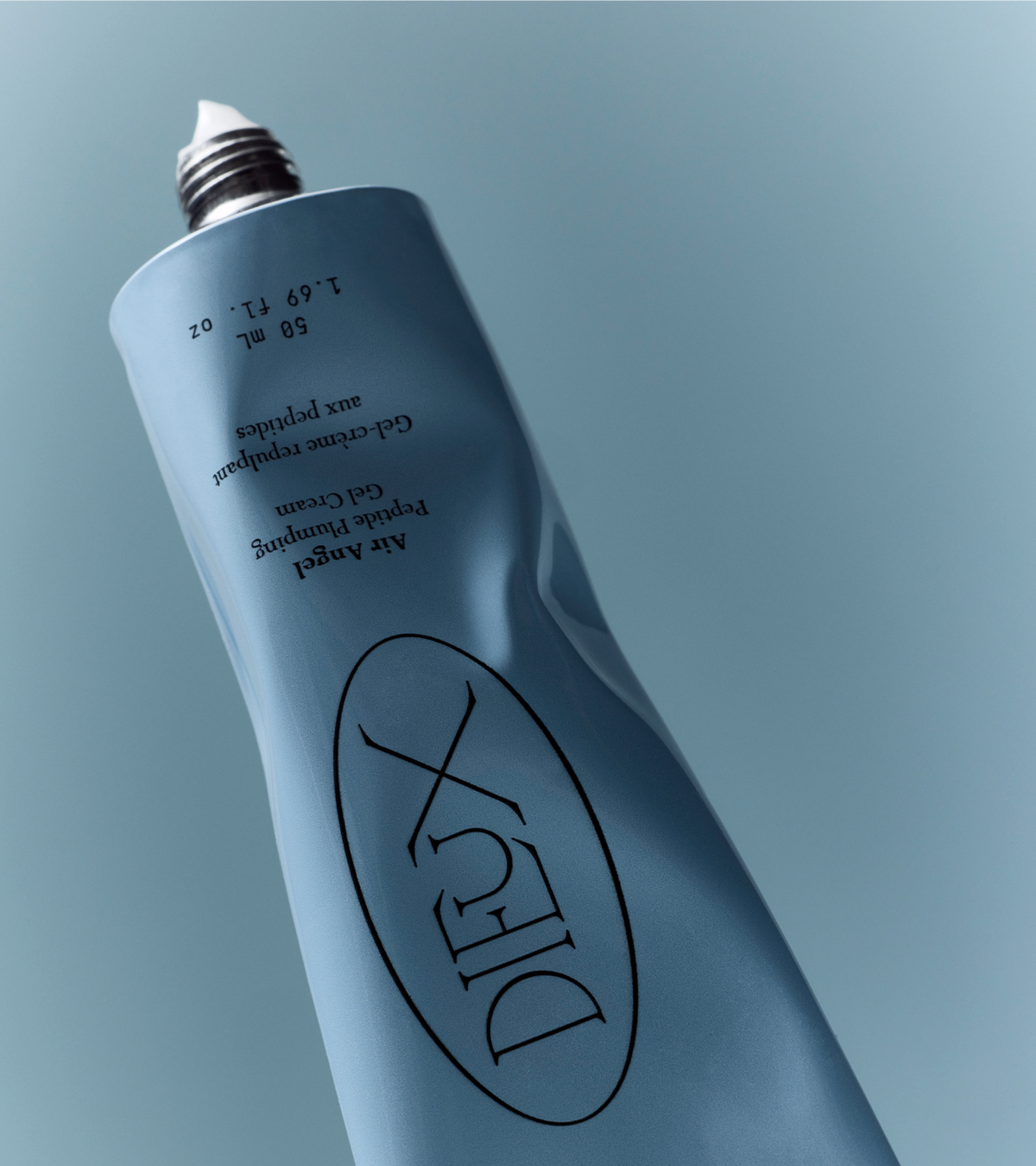 dieux Dieux-air-angel-peptide-plumping-gel-cream-blue-tube-with-white-product-at-tip.