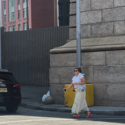 A lifestyle video showcasing someone using The Dieux-It-All Tote to carry their belongings around the city.