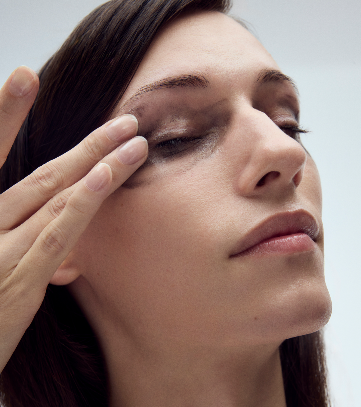 dieux Dieux-the-cleansing-duo-being-applied-to-eyelids.