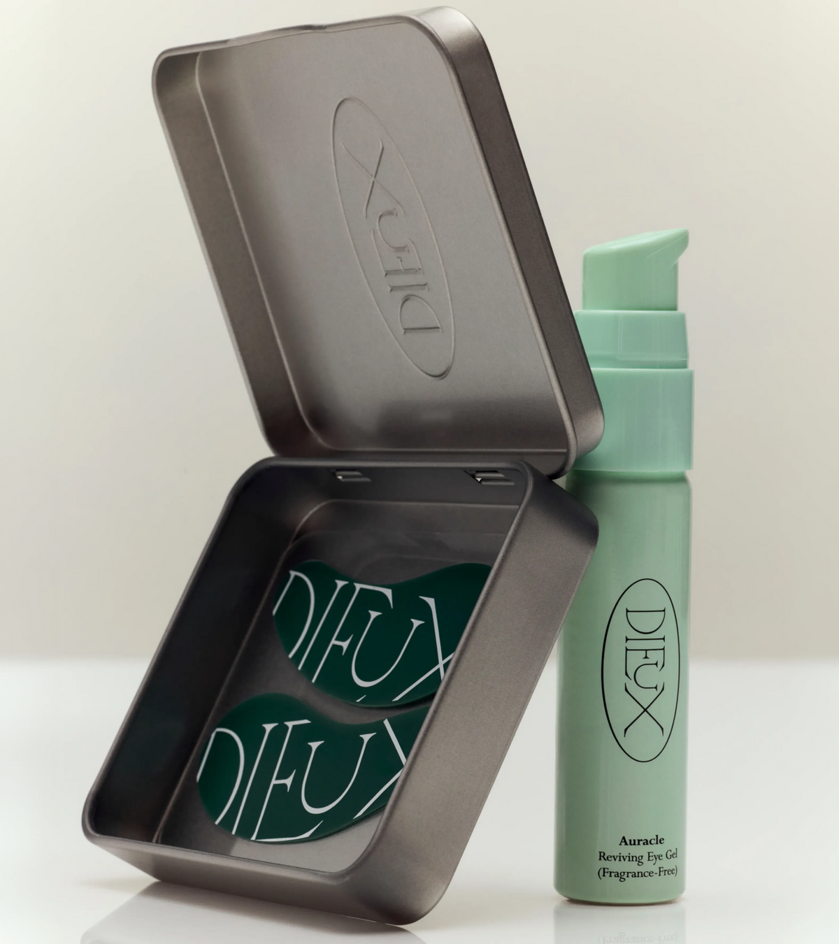 dieux Dieux-eye-revival-duo-dark-green-eye-masks-light-green-eye-serum-pump-bottle.